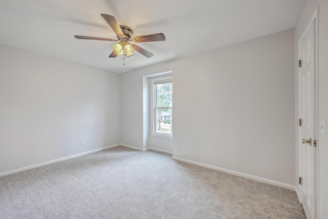 103 Laurens Ct, Summerville, SC 29485 - spare room with baseboards, light colored carpet, and a ceiling fan