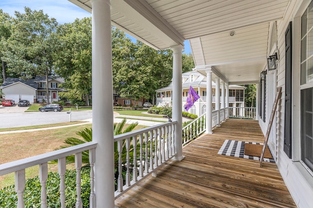 wooden terrace featuring a porch