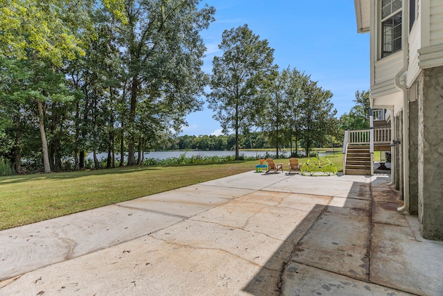 view of patio / terrace with a water view