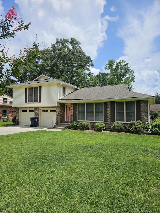 101 Brittany Ct, Summerville, SC 29485 - split level home featuring an attached garage, brick siding, a front yard, and driveway