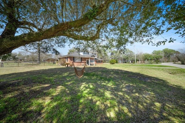 view of yard with fence