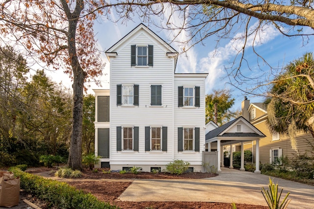 view of front of house with a carport