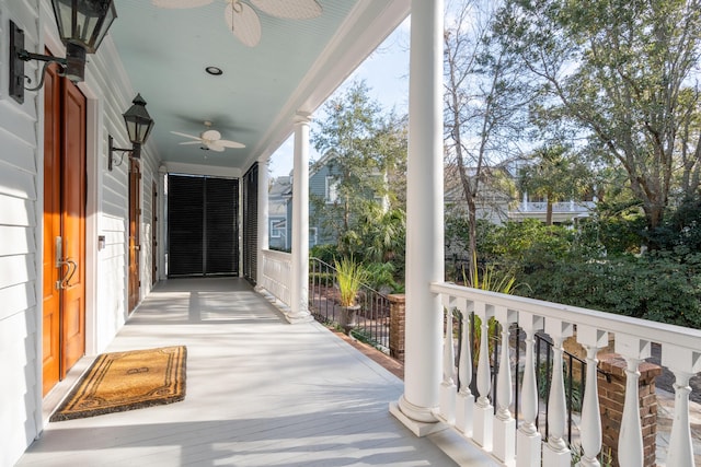 balcony with ceiling fan and covered porch