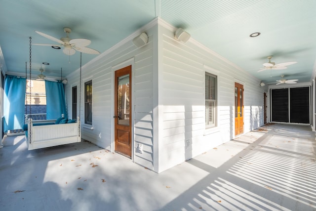 view of patio / terrace with ceiling fan and covered porch