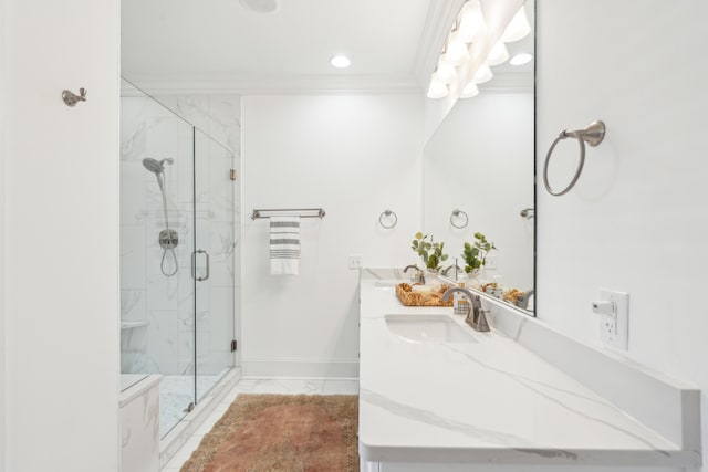 bathroom with crown molding, walk in shower, and vanity