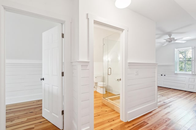 corridor featuring light hardwood / wood-style floors