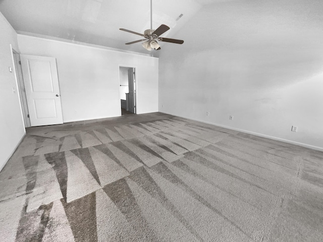 carpeted empty room featuring ceiling fan and lofted ceiling