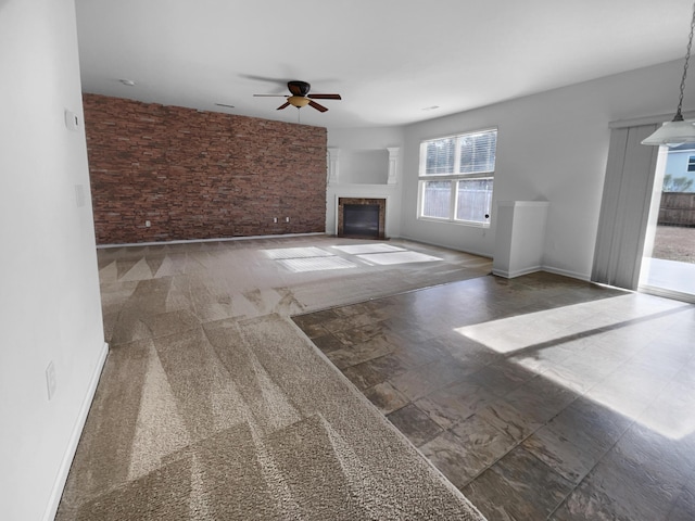 unfurnished living room featuring ceiling fan