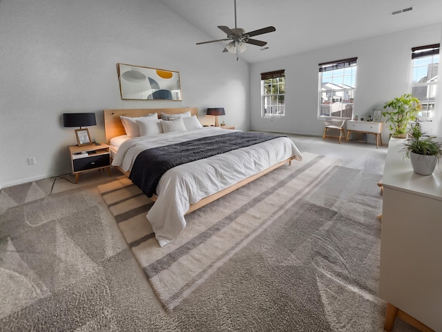 bedroom featuring carpet flooring, ceiling fan, and vaulted ceiling