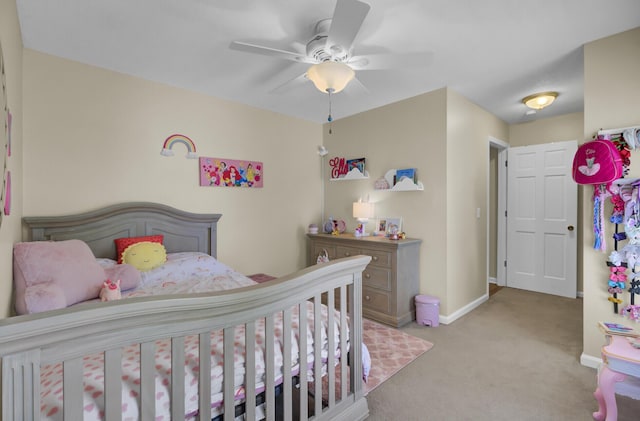 carpeted bedroom featuring ceiling fan