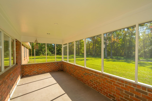 unfurnished sunroom with a healthy amount of sunlight