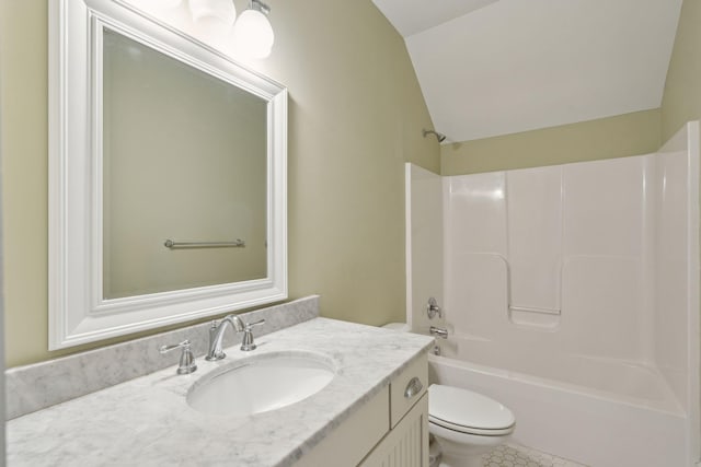 bathroom with vanity, bathing tub / shower combination, tile patterned flooring, toilet, and lofted ceiling