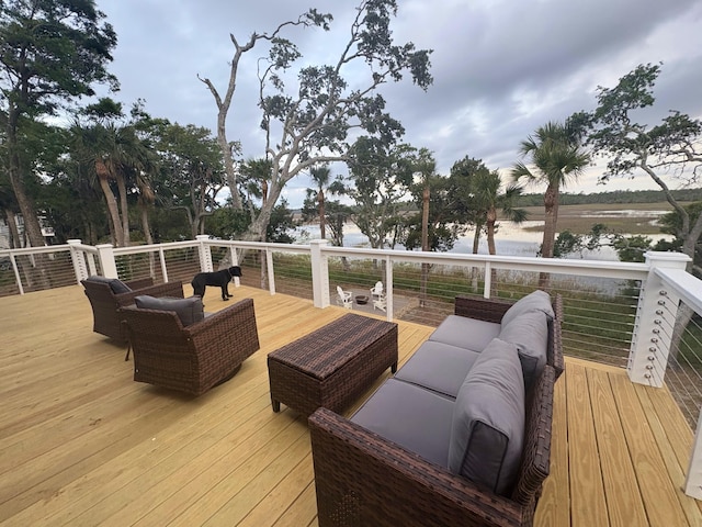 123 Jungle Rd, Edisto Island, SC 29438 - wooden terrace with outdoor lounge area and a water view