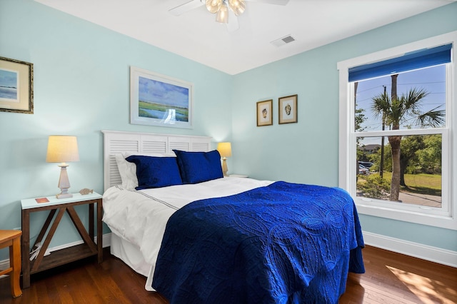 123 Jungle Rd, Edisto Island, SC 29438 - bedroom featuring wood finished floors and ceiling fan