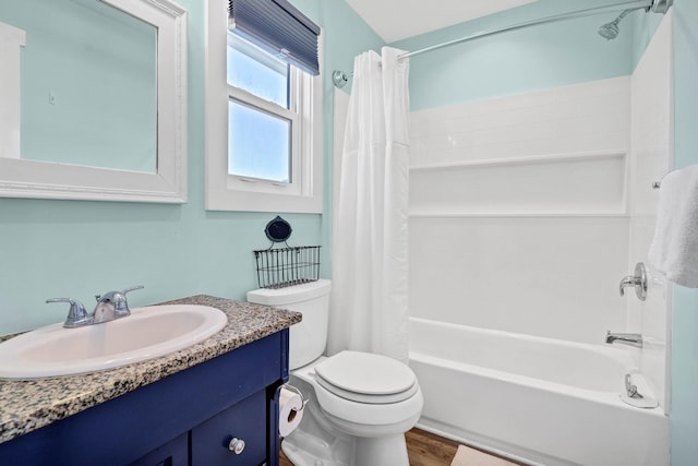 123 Jungle Rd, Edisto Island, SC 29438 - bathroom with vanity, shower / bathtub combination with curtain, and wood finished floors