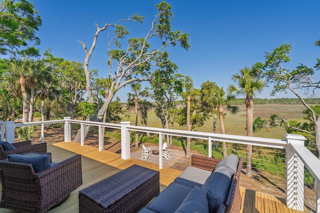 123 Jungle Rd, Edisto Island, SC 29438 - wooden terrace featuring an outdoor hangout area