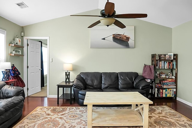 living area with a ceiling fan, visible vents, wood finished floors, and lofted ceiling