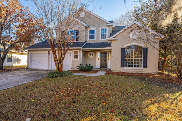 7011 Windmill Creek Rd, Charleston, SC 29414 - traditional-style home featuring stucco siding, concrete driveway, a front yard, a garage, and a shingled roof