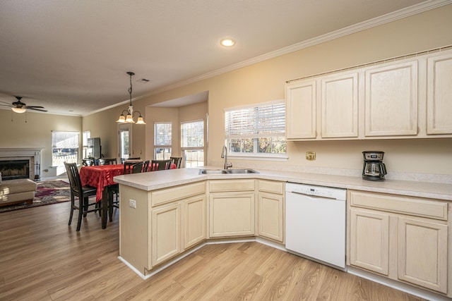 7011 Windmill Creek Rd, Charleston, SC 29414 - kitchen with white dishwasher, a ceiling fan, open floor plan, ornamental molding, and a fireplace
