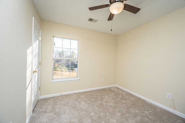 7011 Windmill Creek Rd, Charleston, SC 29414 - spare room featuring carpet floors, a ceiling fan, and a textured ceiling