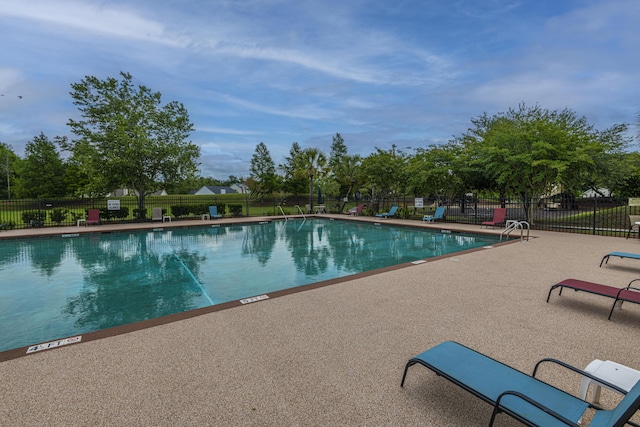 7011 Windmill Creek Rd, Charleston, SC 29414 - community pool featuring a patio