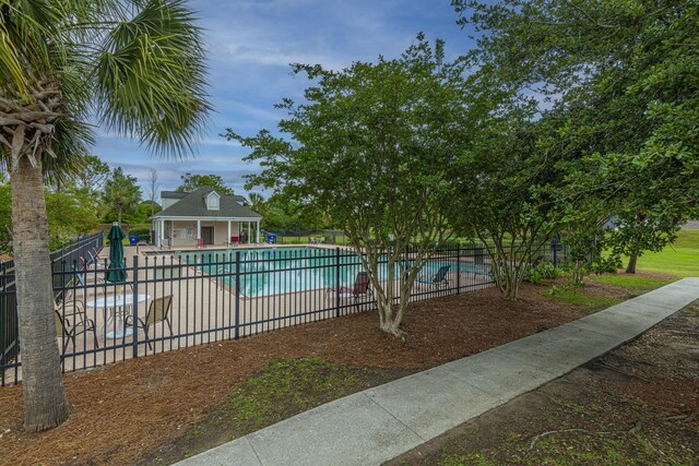 7011 Windmill Creek Rd, Charleston, SC 29414 - community pool with a patio