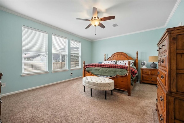 bedroom featuring light carpet, crown molding, and ceiling fan