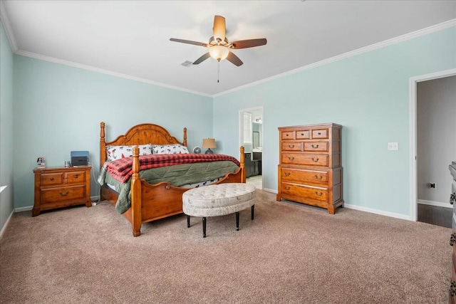 bedroom featuring ornamental molding, carpet floors, ceiling fan, and ensuite bath