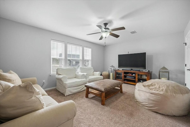 living room with light carpet and ceiling fan