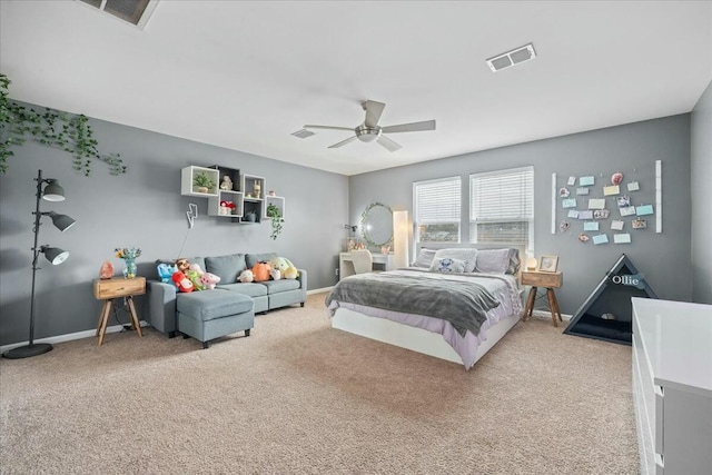 bedroom featuring ceiling fan and carpet