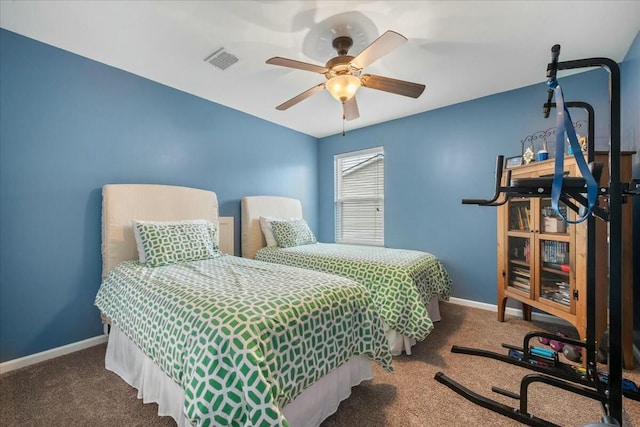 bedroom with ceiling fan and carpet flooring