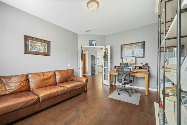 office area featuring dark wood-type flooring and french doors