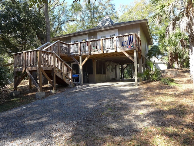 view of front of property featuring a wooden deck