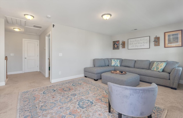 living room featuring light carpet