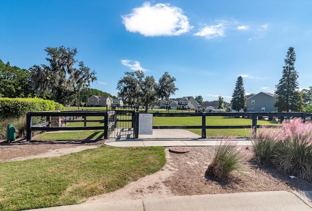 view of community featuring a yard