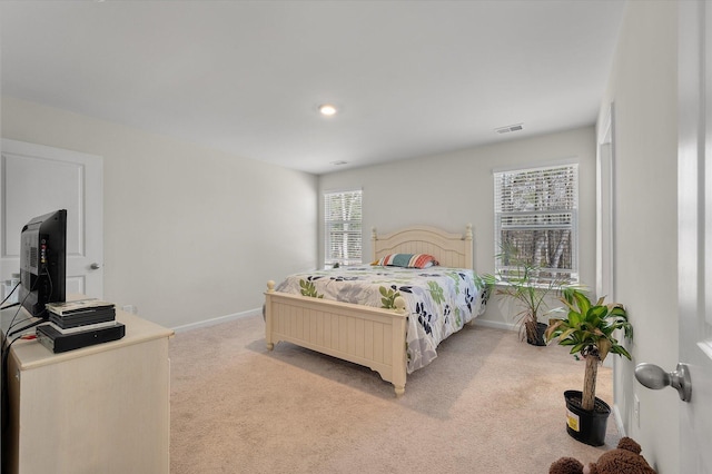 bedroom with recessed lighting, baseboards, visible vents, and light carpet