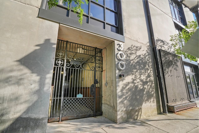 doorway to property with a gate