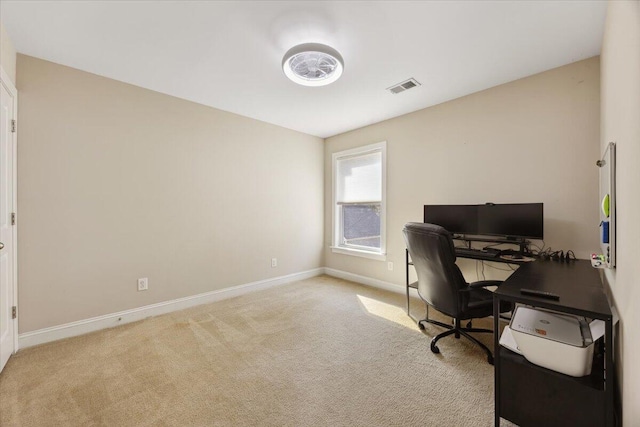 home office featuring visible vents, baseboards, and carpet floors