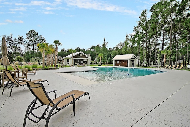 pool with a patio