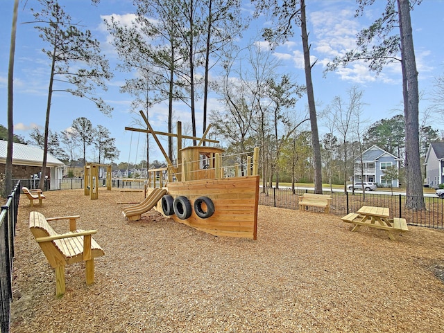 community play area featuring fence