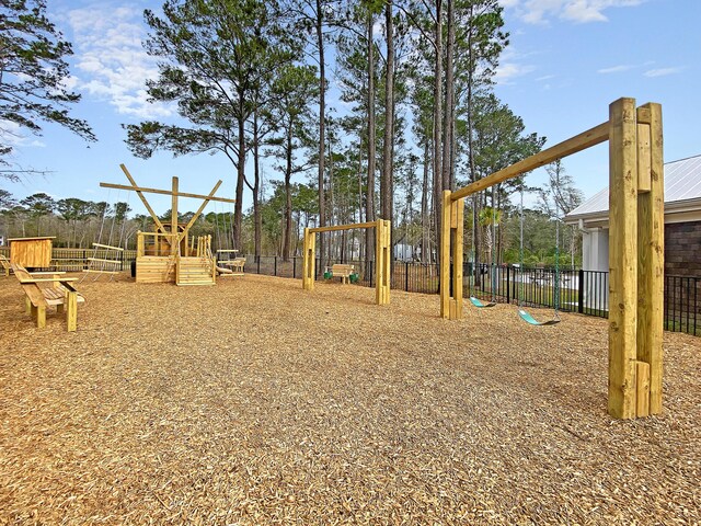 communal playground featuring fence