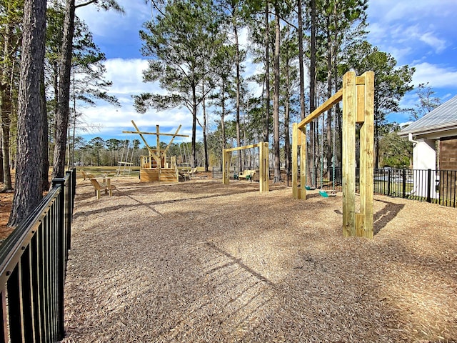 view of yard with fence and playground community