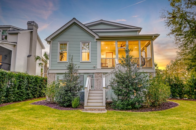 view of front of home featuring a lawn