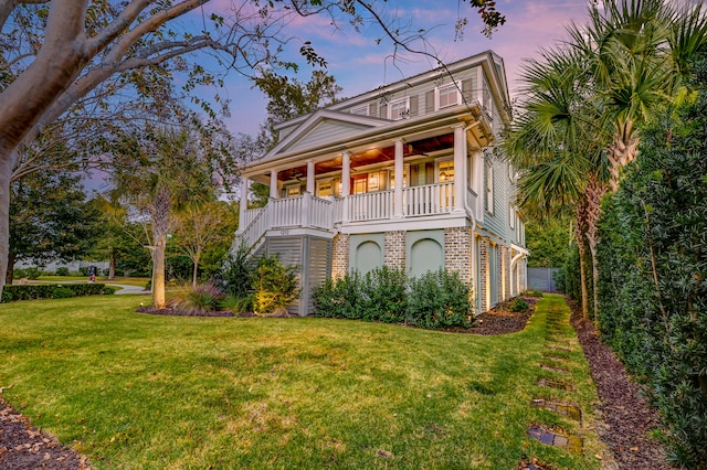 view of front of house with a lawn