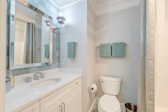 bathroom with ornamental molding, curtained shower, vanity, and toilet