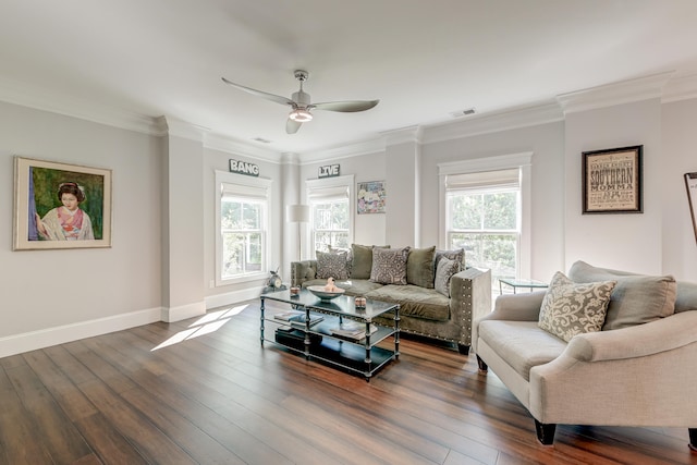 living room with crown molding, dark hardwood / wood-style floors, and a wealth of natural light