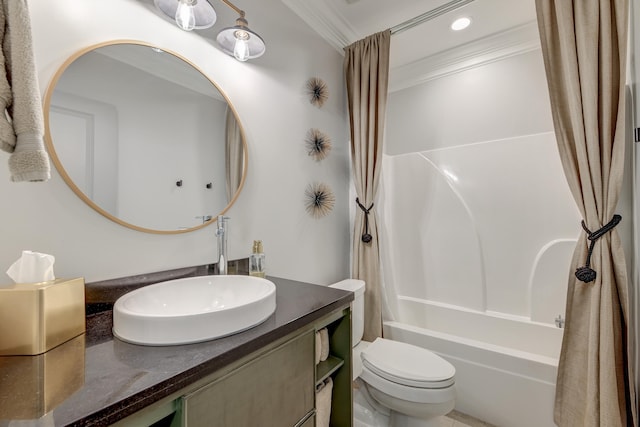 full bathroom featuring vanity, ornamental molding, shower / bath combination with curtain, and toilet