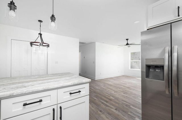 2924 Chicora Ave, North Charleston, SC 29405 - kitchen with stainless steel refrigerator with ice dispenser, ceiling fan, wood finished floors, white cabinetry, and hanging light fixtures