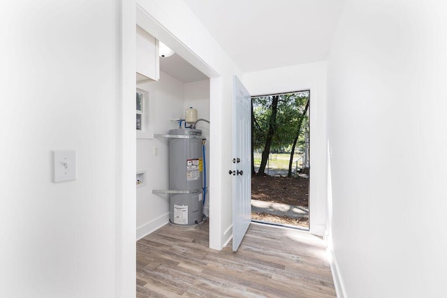2924 Chicora Ave, North Charleston, SC 29405 - interior space featuring water heater and light wood-style flooring