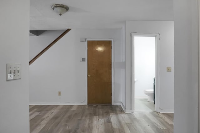 empty room with light hardwood / wood-style floors